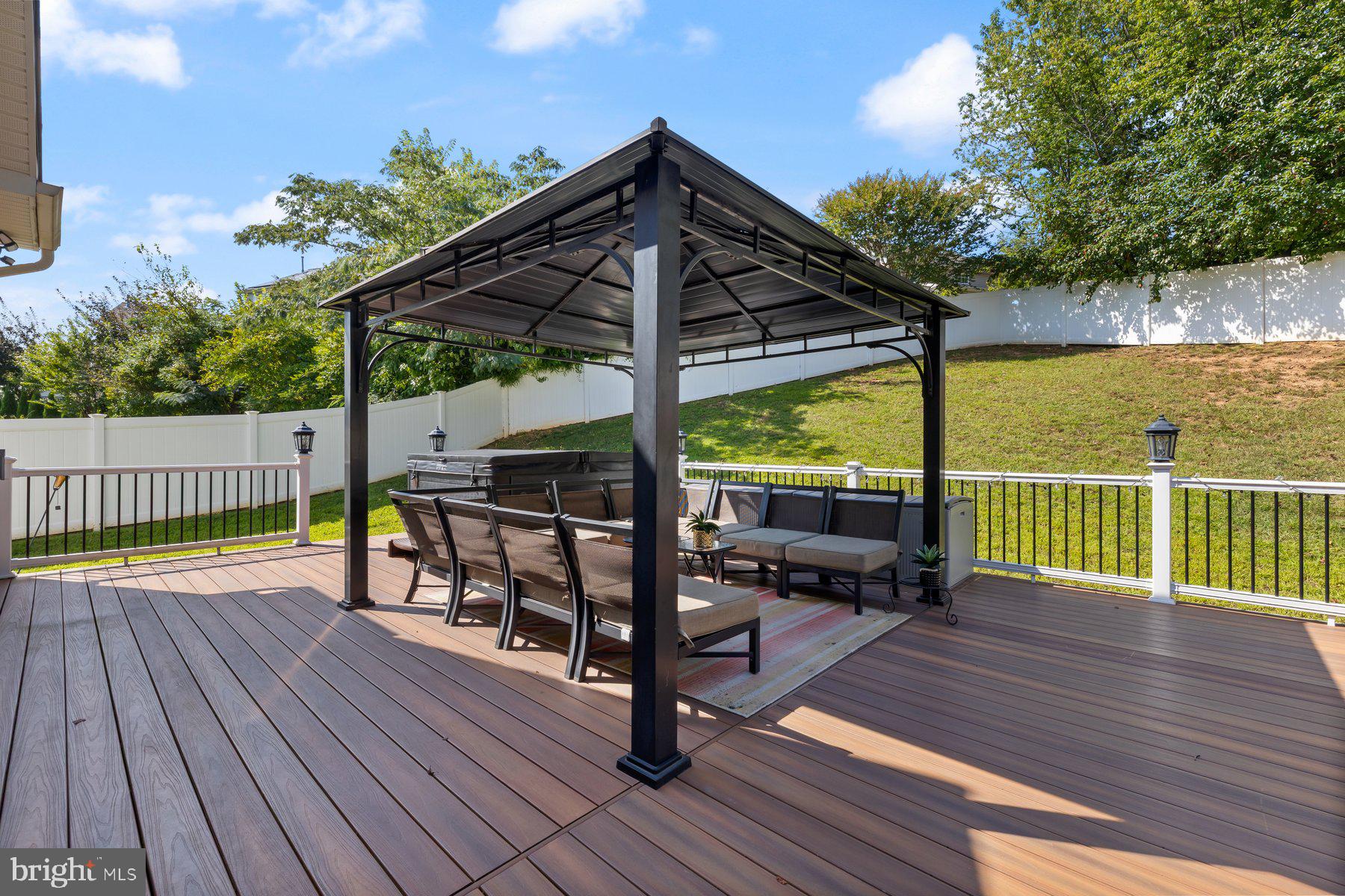 6 Cedar Grove Court Baltimore, MD 21237 - Photo 45 of 50 a view of a deck with wooden floor and outdoor seating