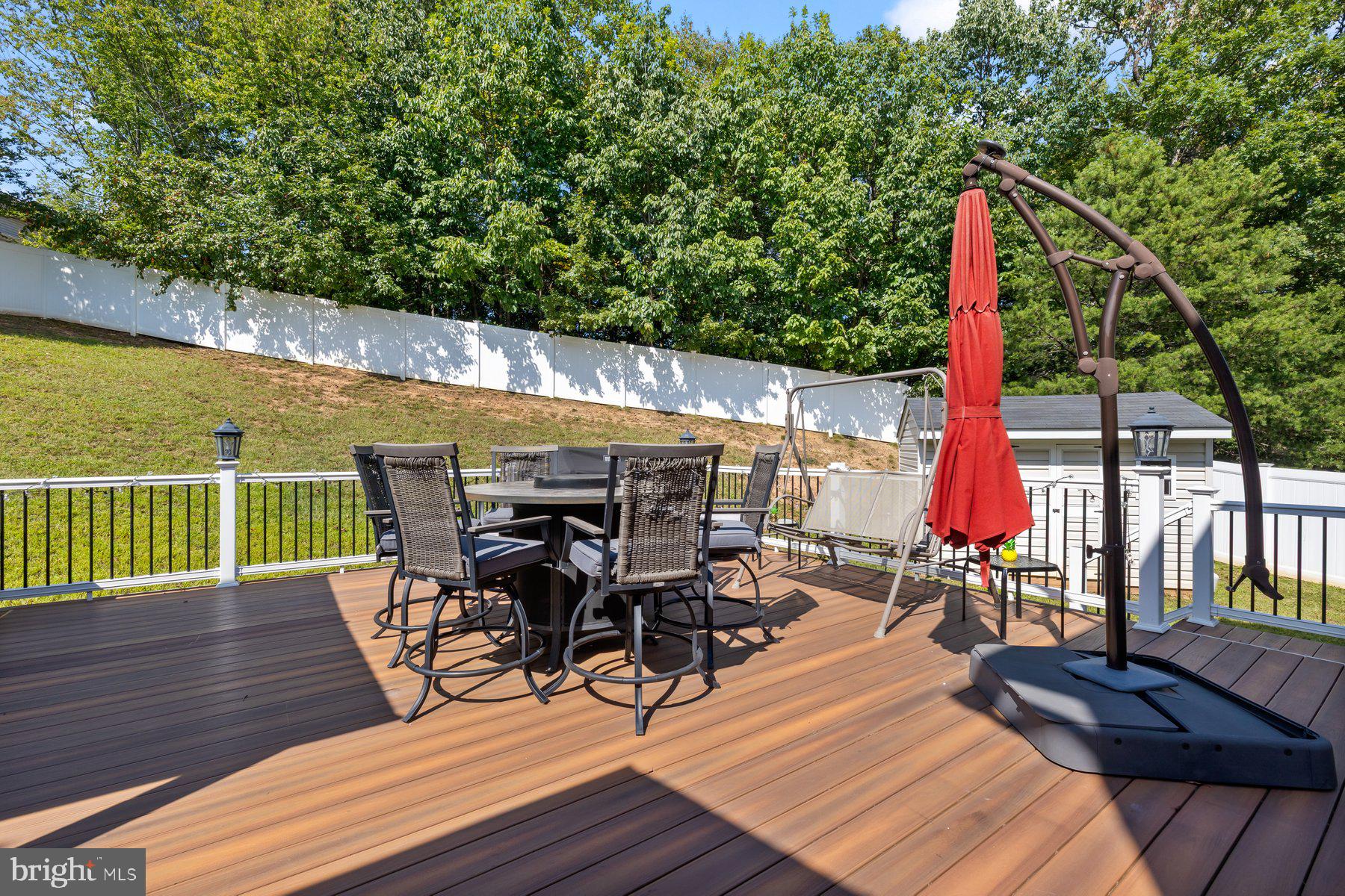 6 Cedar Grove Court Baltimore, MD 21237 - Photo 46 of 50 a view of a dining tables and chairs in the patio
