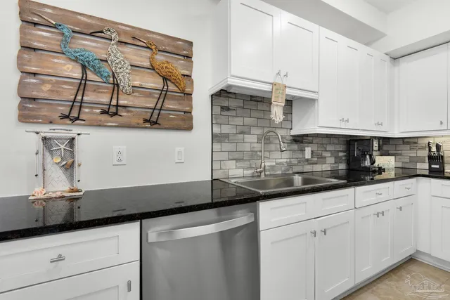 a terrace with outdoor seating and city view