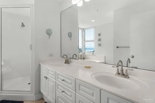 a bedroom with a bed and furniture