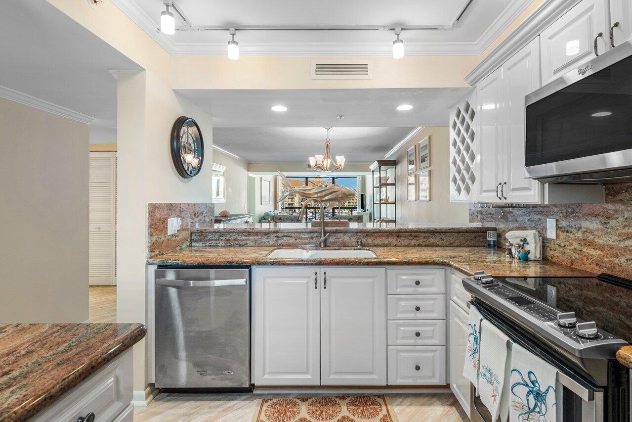 2601 Marina Isle Way, Unit 303 Jupiter, FL 33477 - Photo 6 of 36 Pass Through Kitchen