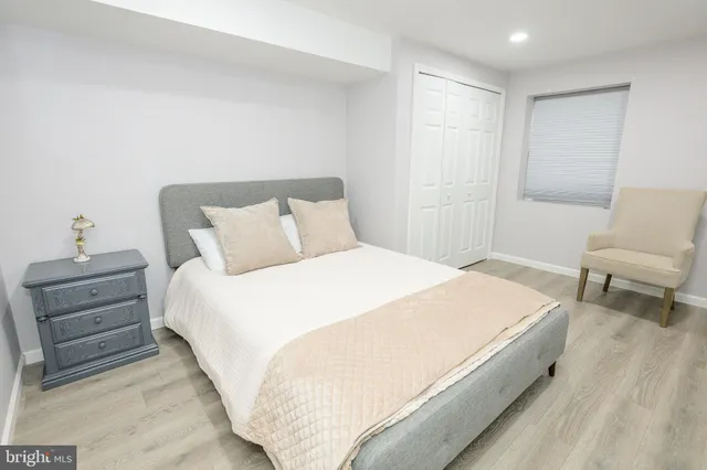 a white toilet sitting next to a bathroom sink