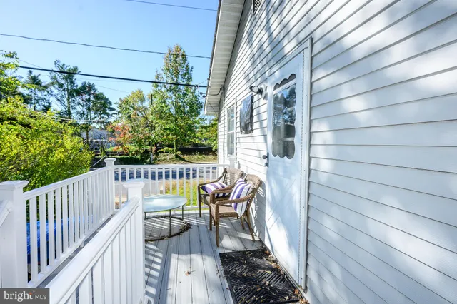a view of backyard with green space