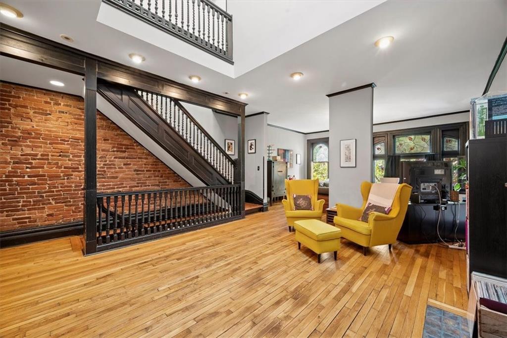 1232 Resaca Place Pittsburgh, PA 15212 - Photo 17 of 44 a outdoor space with wooden floor and furniture