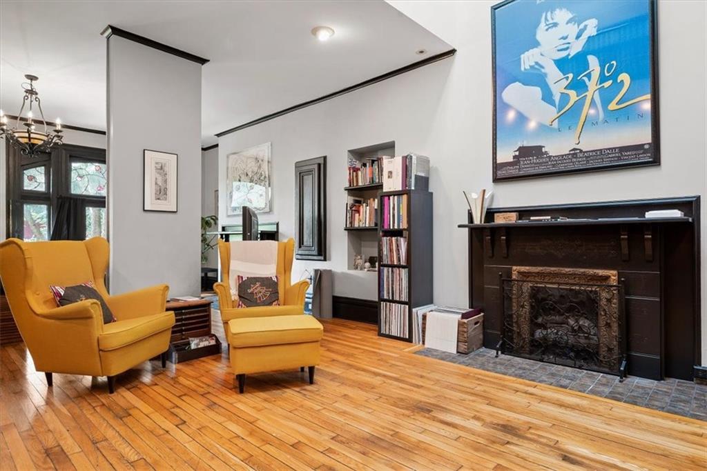 1232 Resaca Place Pittsburgh, PA 15212 - Photo 22 of 44 a living room with furniture and a fireplace