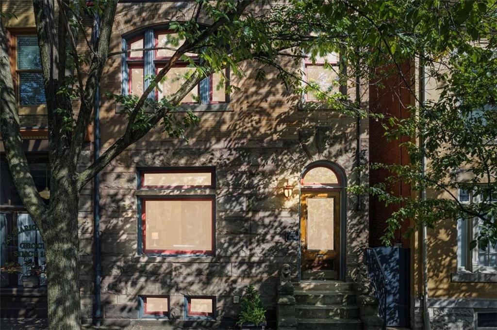 1232 Resaca Place Pittsburgh, PA 15212 - Photo 5 of 44 a front view of a house with a tree