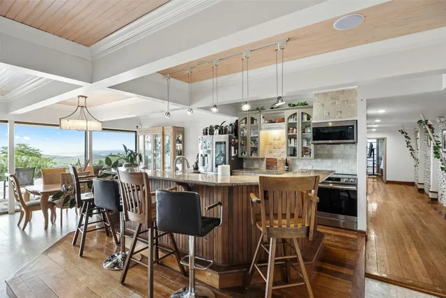 a view of a dining room with furniture
