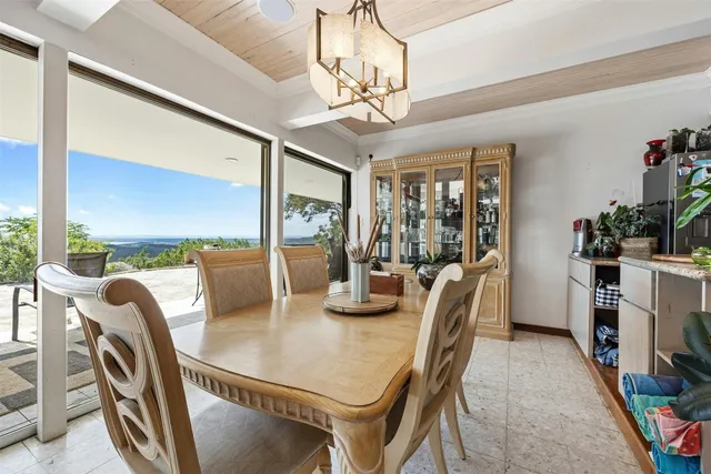 a kitchen with cabinets a sink and appliances