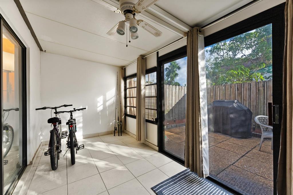 3320 Simms Street, Unit 11C Hollywood, FL 33021 - Photo 15 of 37 a view of entryway with a floor to ceiling window and stairs
