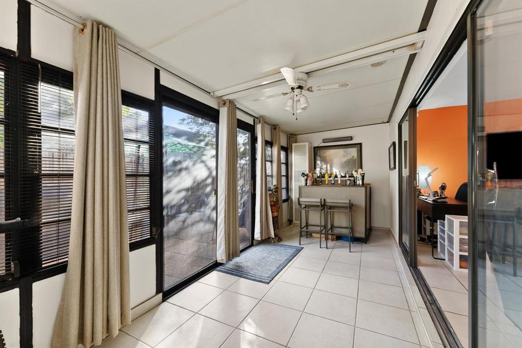 3320 Simms Street, Unit 11C Hollywood, FL 33021 - Photo 16 of 37 a lobby with furniture and a table