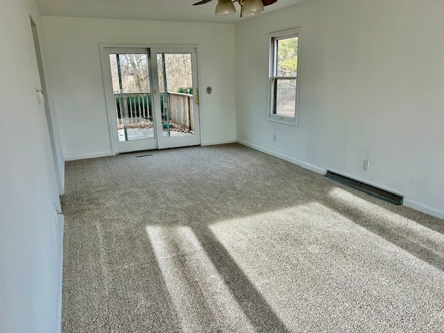 1515 6 Points Road Bloomington, IL 61701 - Photo 10 of 29 an empty room with windows