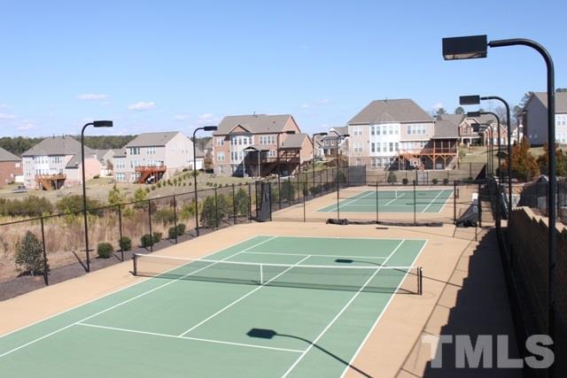 317 Euphoria Circle Cary, NC 27519 - Photo 13 of 22 a tennis court with view of building