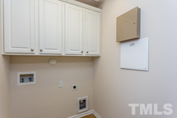 317 Euphoria Circle Cary, NC 27519 - Photo 15 of 22 a bathroom with a sink and mirror