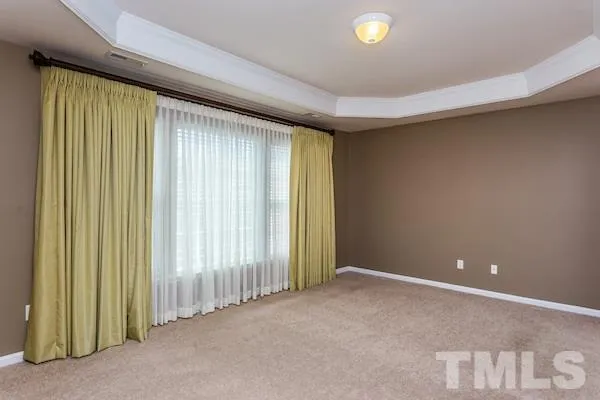 a view of a room with windows