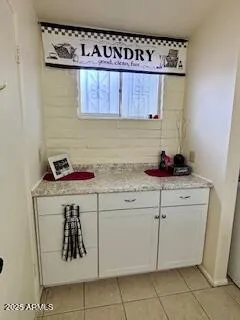 a kitchen with a cabinets and a stove