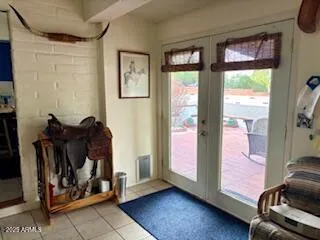 a view of workspace with a window and elevator