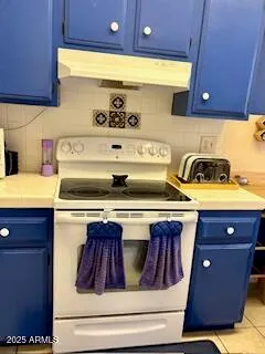 a kitchen with a sink and a stove