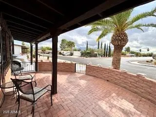 a bed room with a bed and a television
