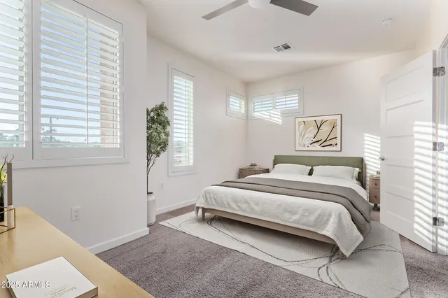 a bathroom with a shower sink and mirror