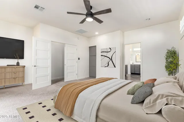 a picture of a bench in front of a wall