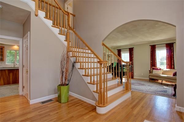 24 Battle Flagg Road Bedford, MA 01730 - Photo 5 of 30 a view of entryway and hall with wooden floor