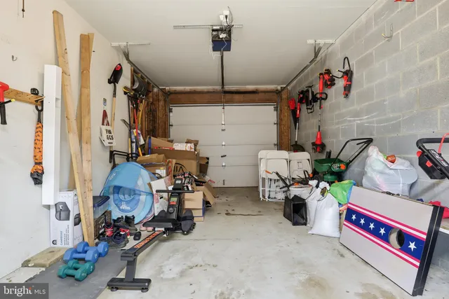 a storage room with furniture and clutter