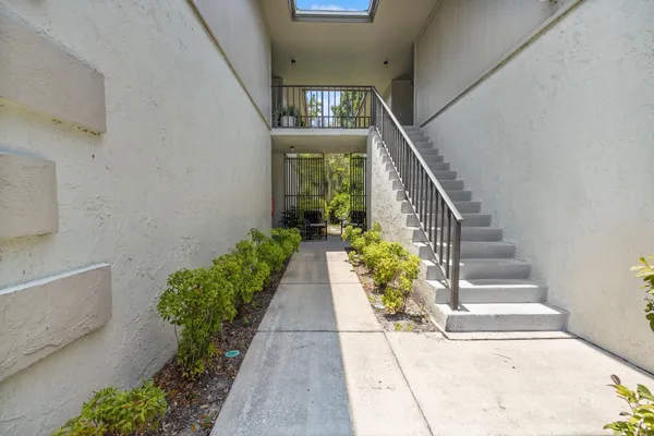 a view of entryway with flower pots
