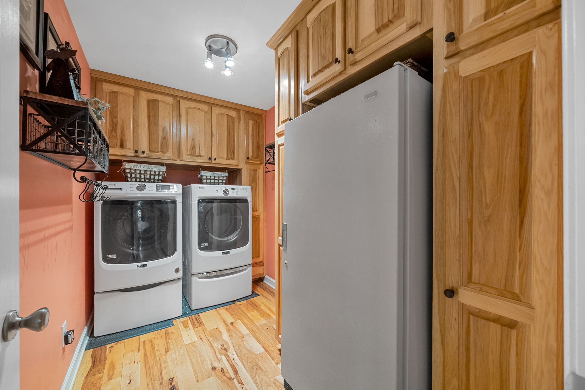 2834 Mosley Ferry Road Ashland City, TN 37015 - Photo 29 of 89 a view of a storage and utility room with washer and dryer