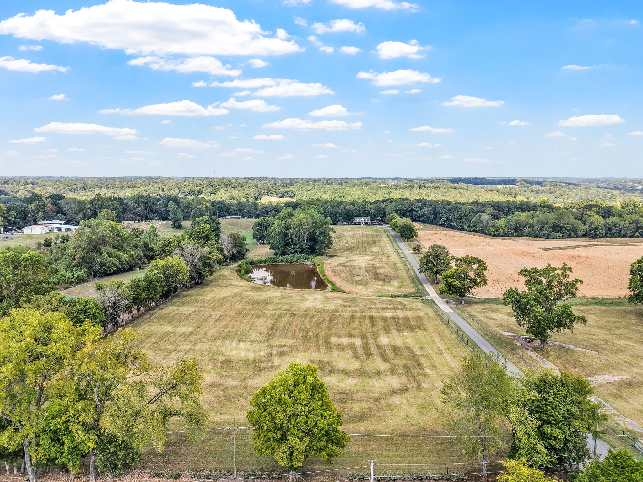 2834 Mosley Ferry Road Ashland City, TN 37015 - Photo 3 of 89 a view of a lake with a yard