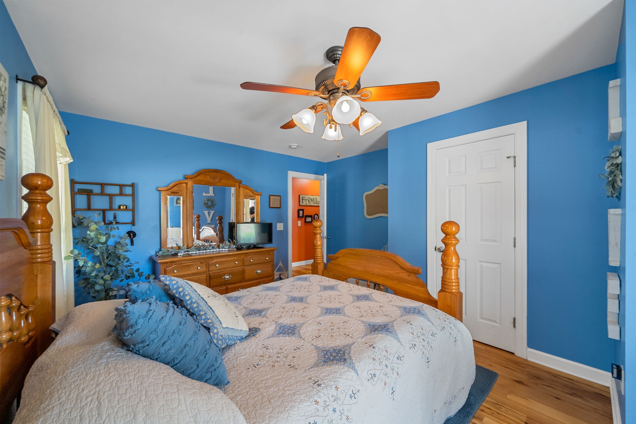 2834 Mosley Ferry Road Ashland City, TN 37015 - Photo 31 of 89 a bedroom with a bed and a chandelier