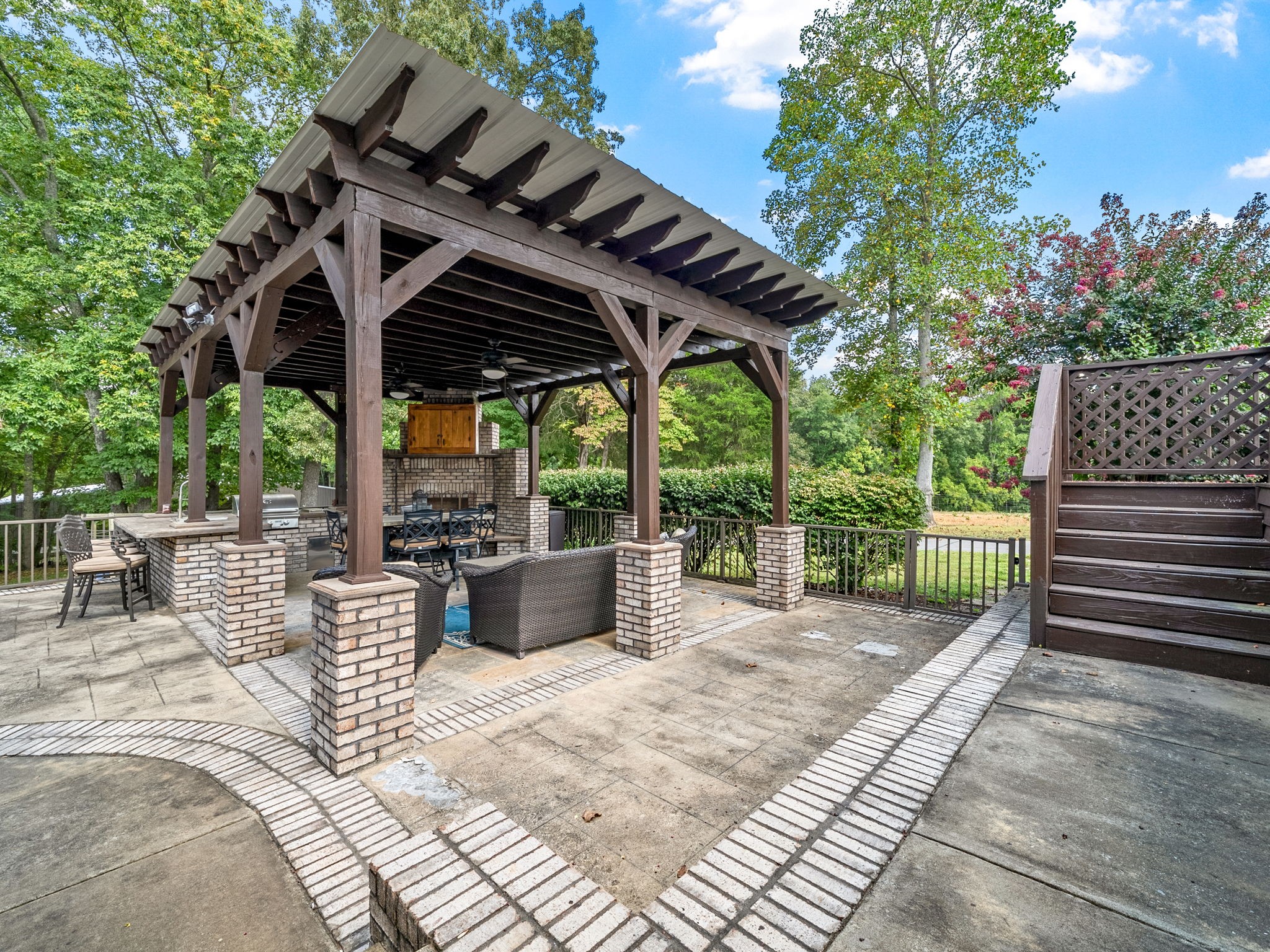2834 Mosley Ferry Road Ashland City, TN 37015 - Photo 70 of 89 a view of a patio with a table chairs and a backyard