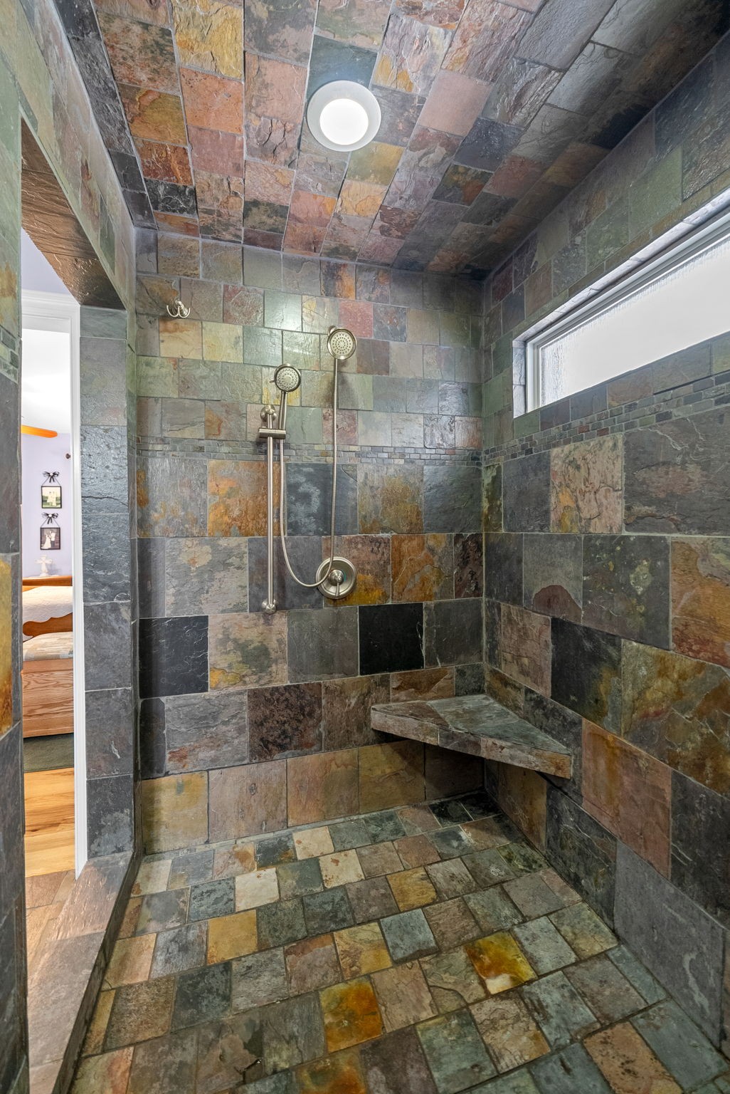 2834 Mosley Ferry Road Ashland City, TN 37015 - Photo 84 of 89 a bathroom with a glass shower door