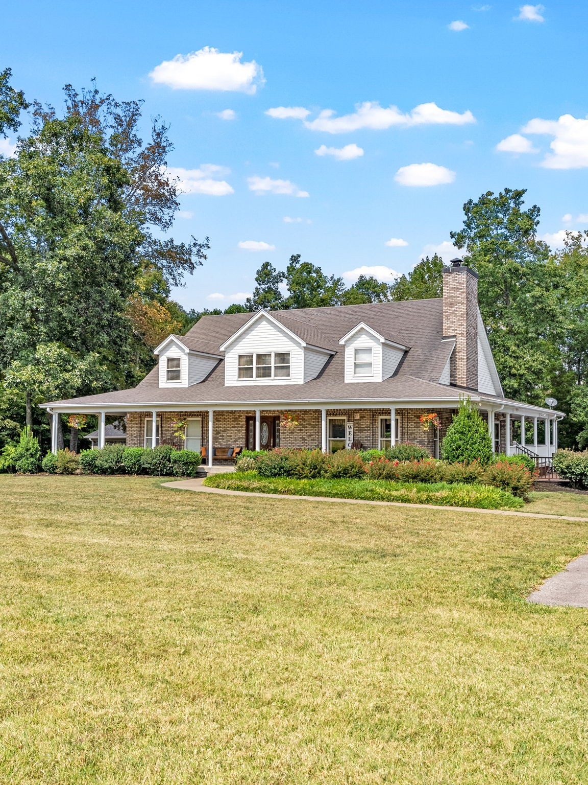 2834 Mosley Ferry Road Ashland City, TN 37015 - Photo 88 of 89 a front view of house with yard and trees