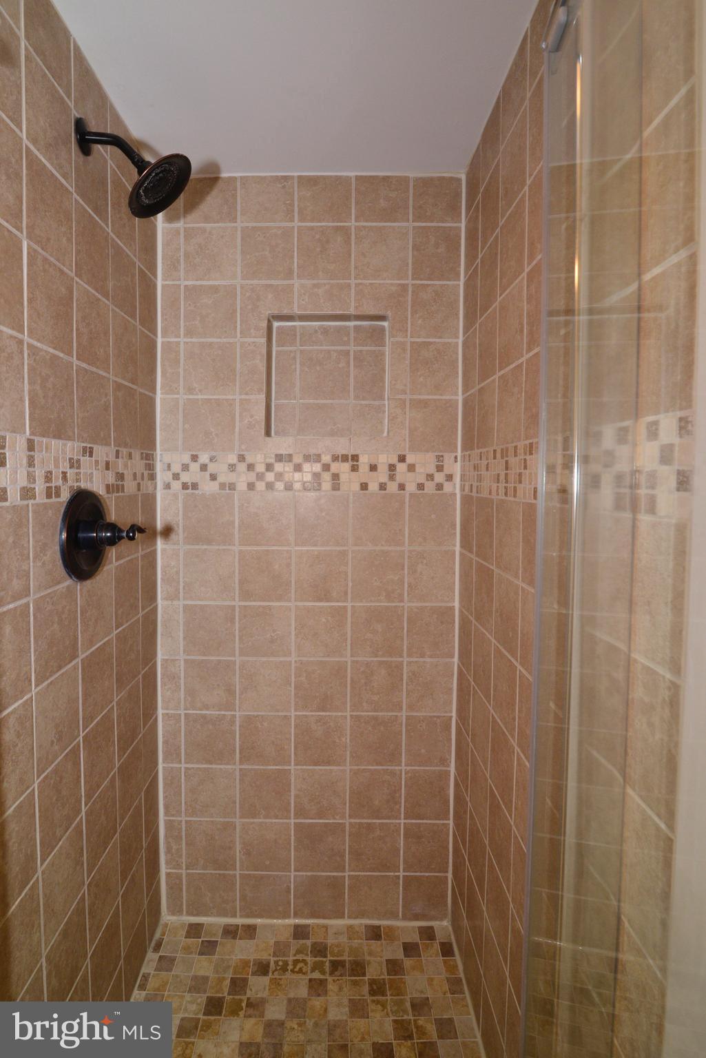11013 Thrush Ridge Road Reston, VA 20191 - Photo 26 of 38 a bathroom with a shower