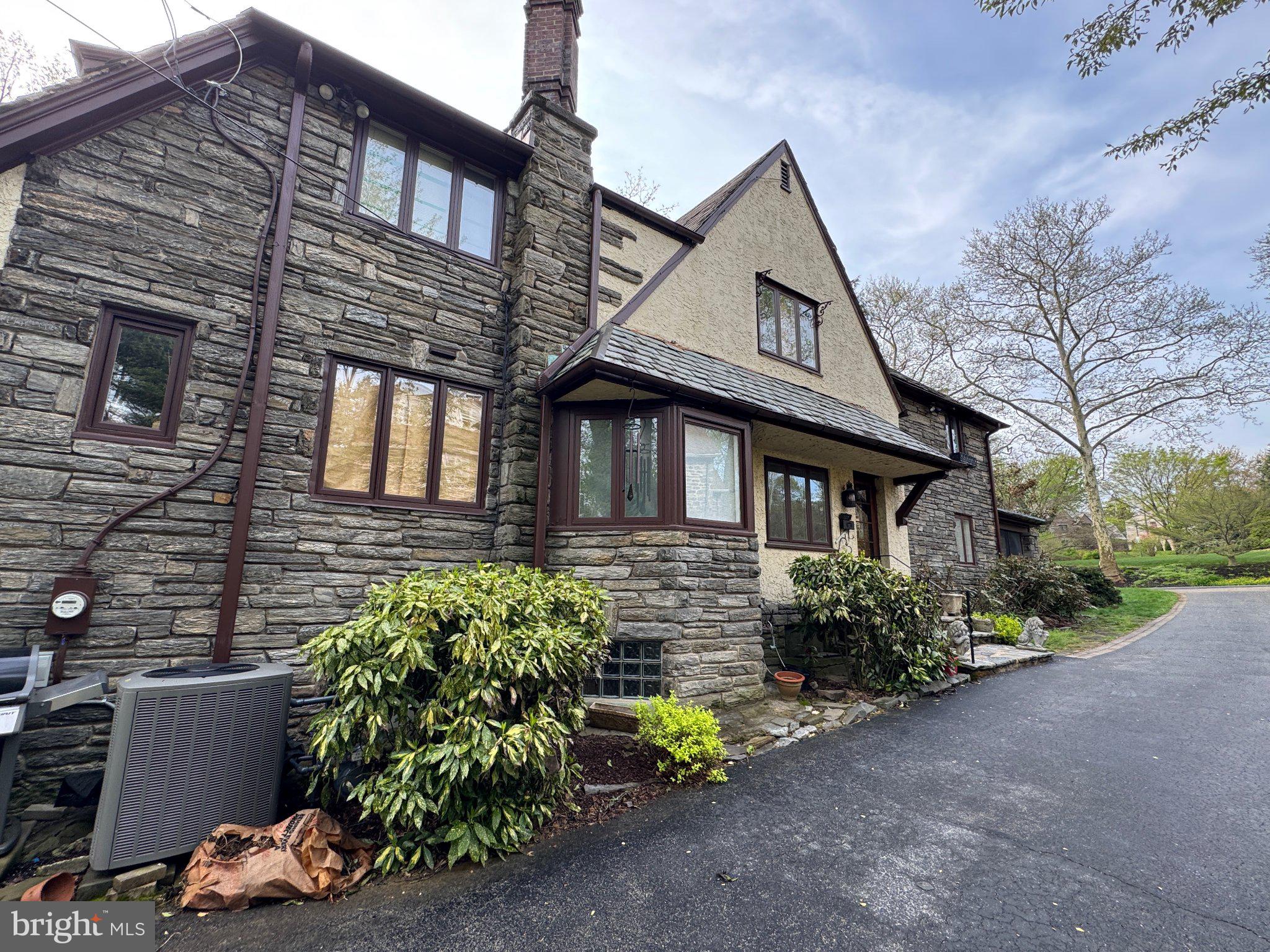 1217 Medford Road Wynnewood, PA 19096 - Photo 5 of 92 Driveway Entry View w/ Breakfast Room Bay Window