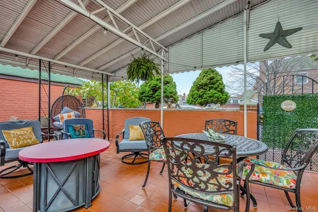 a outdoor seating area with furniture and outdoor seating