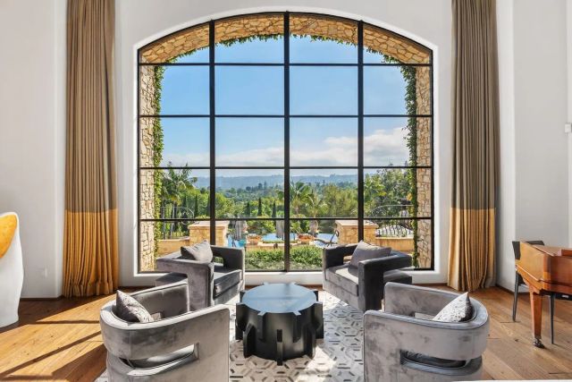 a living room with furniture and a window