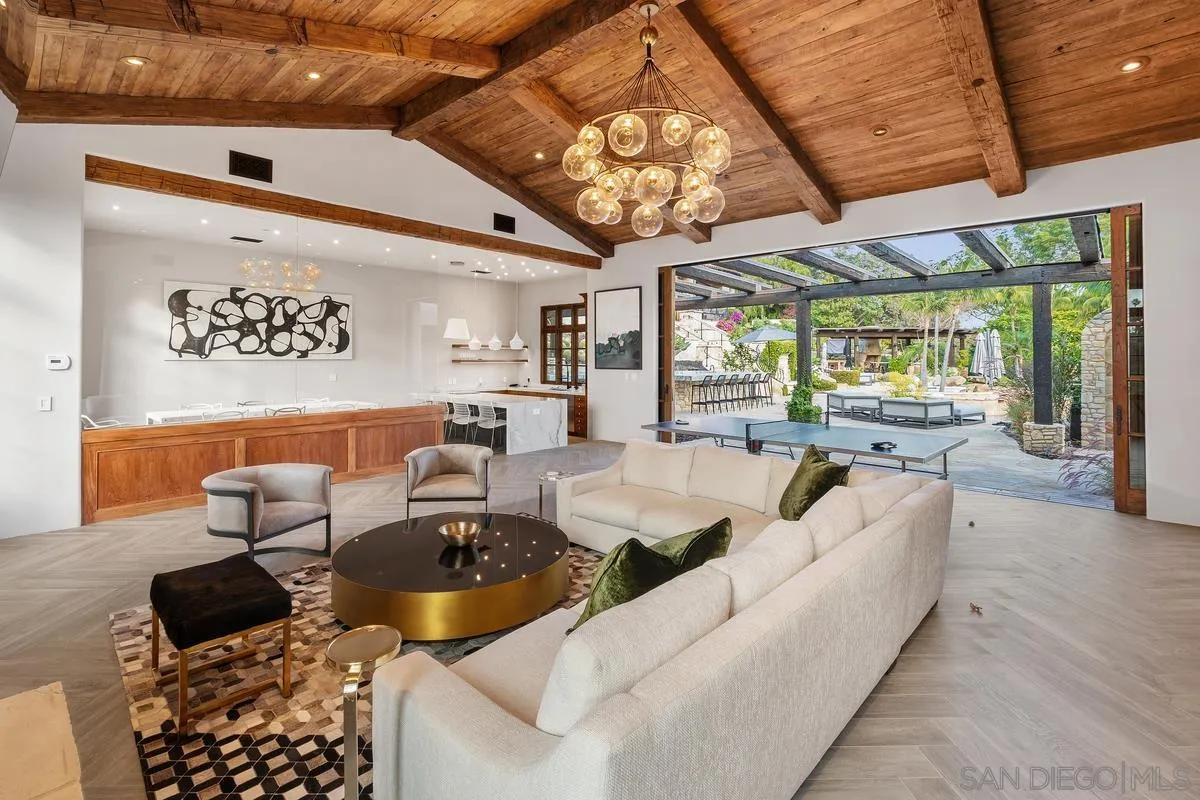 6720 Las Colinas Rancho Santa Fe, CA 92067 - Photo 30 of 36 a living room with furniture a large window and stainless steel appliances