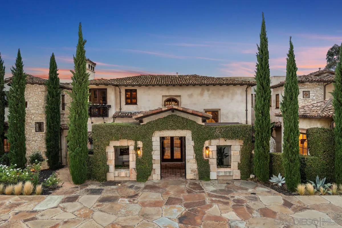 6720 Las Colinas Rancho Santa Fe, CA 92067 - Photo 32 of 36 a front view of a house with a yard