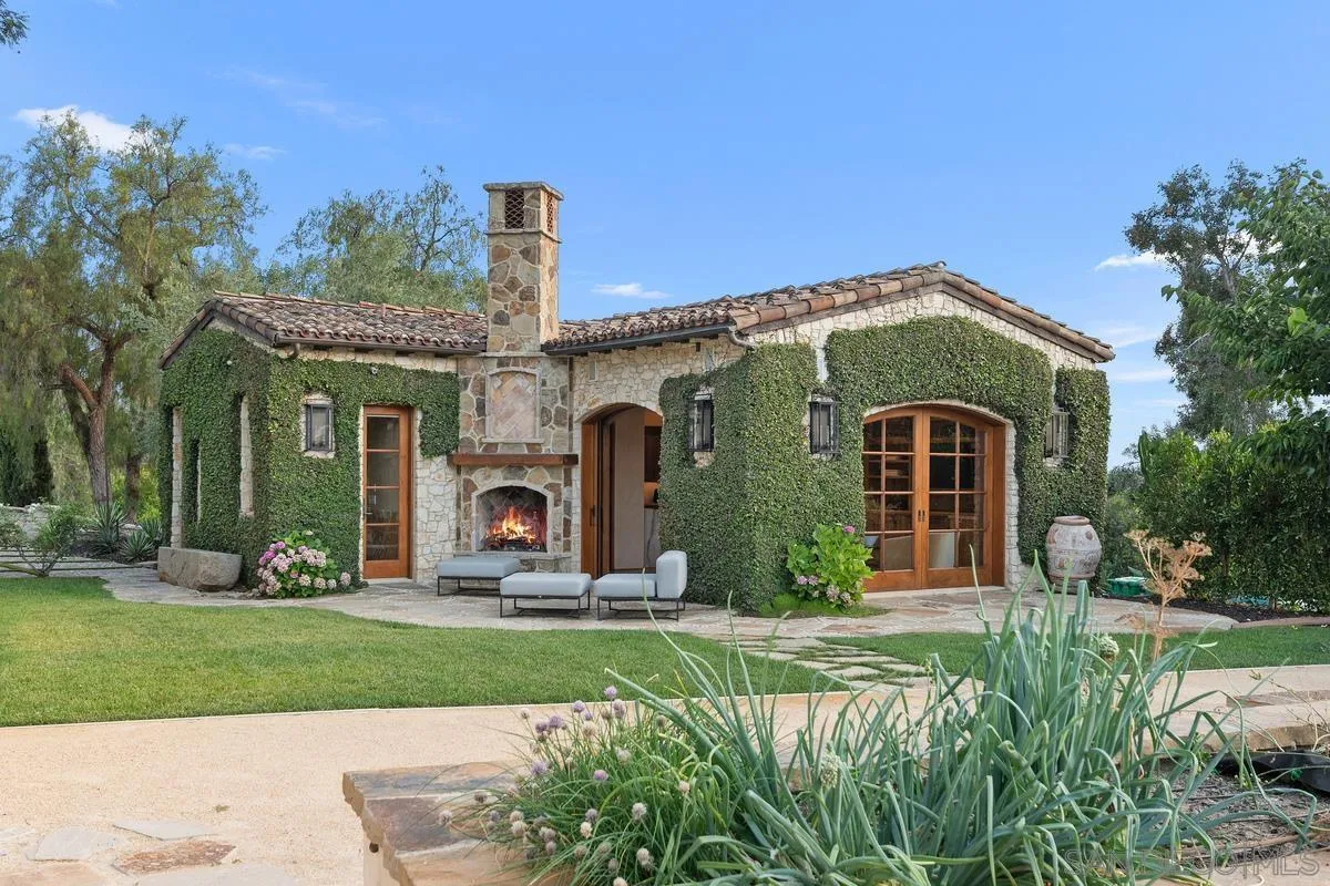 6720 Las Colinas Rancho Santa Fe, CA 92067 - Photo 33 of 36 front view of a house with a yard