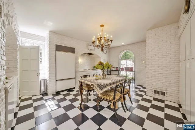 a kitchen with a table and a stove
