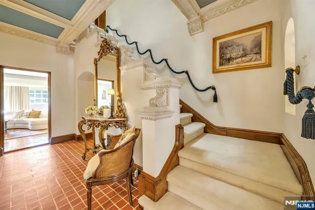 a bedroom with a bed and a view of bedroom