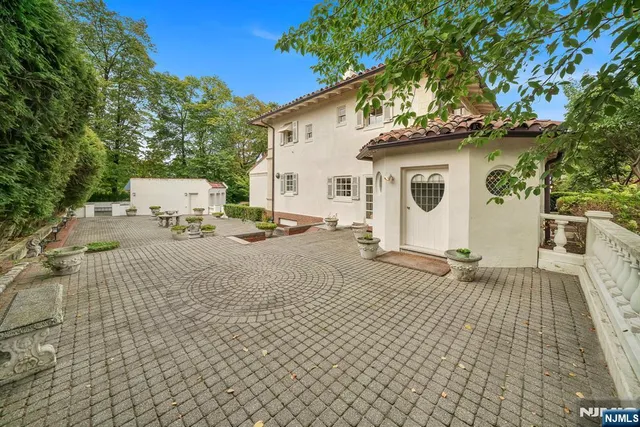 a view of a car parked in front of a building