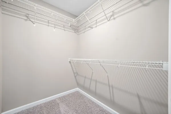 a view of a room with racks on the wall