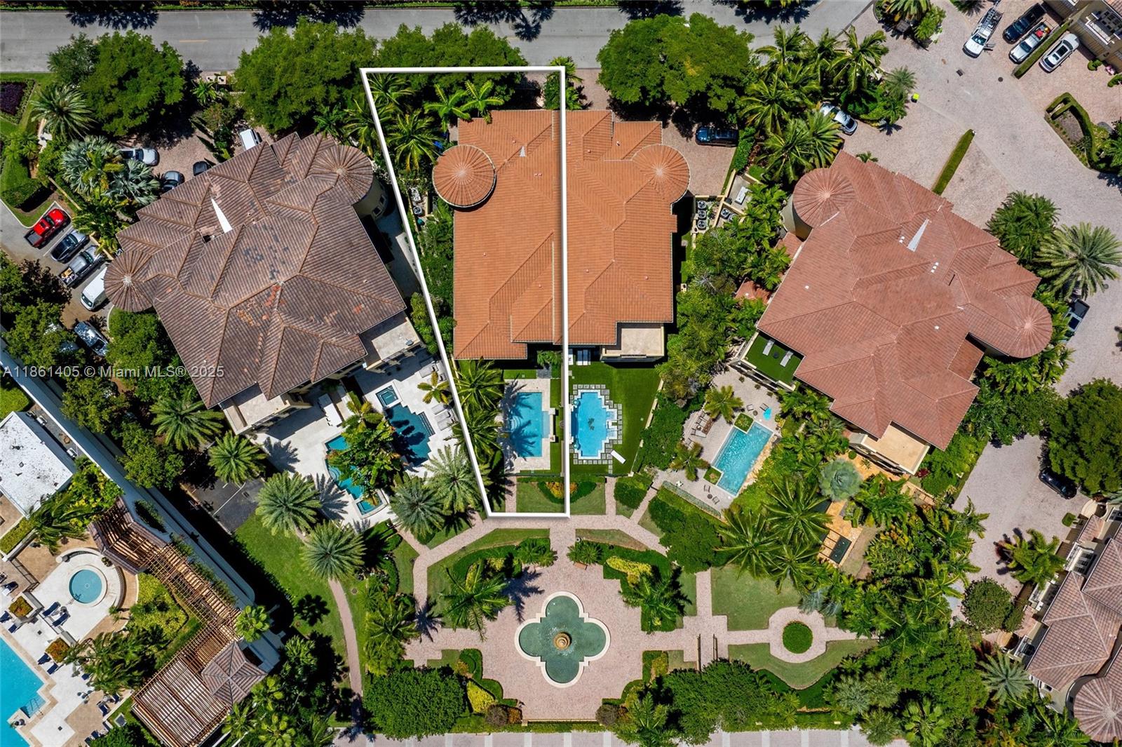 1504 Island Boulevard Aventura, FL 33160 - Photo 2 of 39 an aerial view of a house with a garden