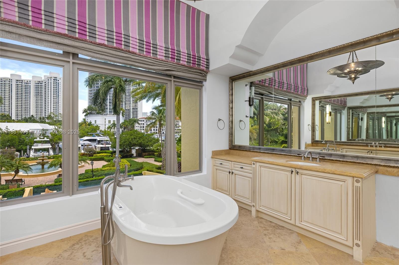 1504 Island Boulevard Aventura, FL 33160 - Photo 29 of 39 a bathroom with a sink and a large window