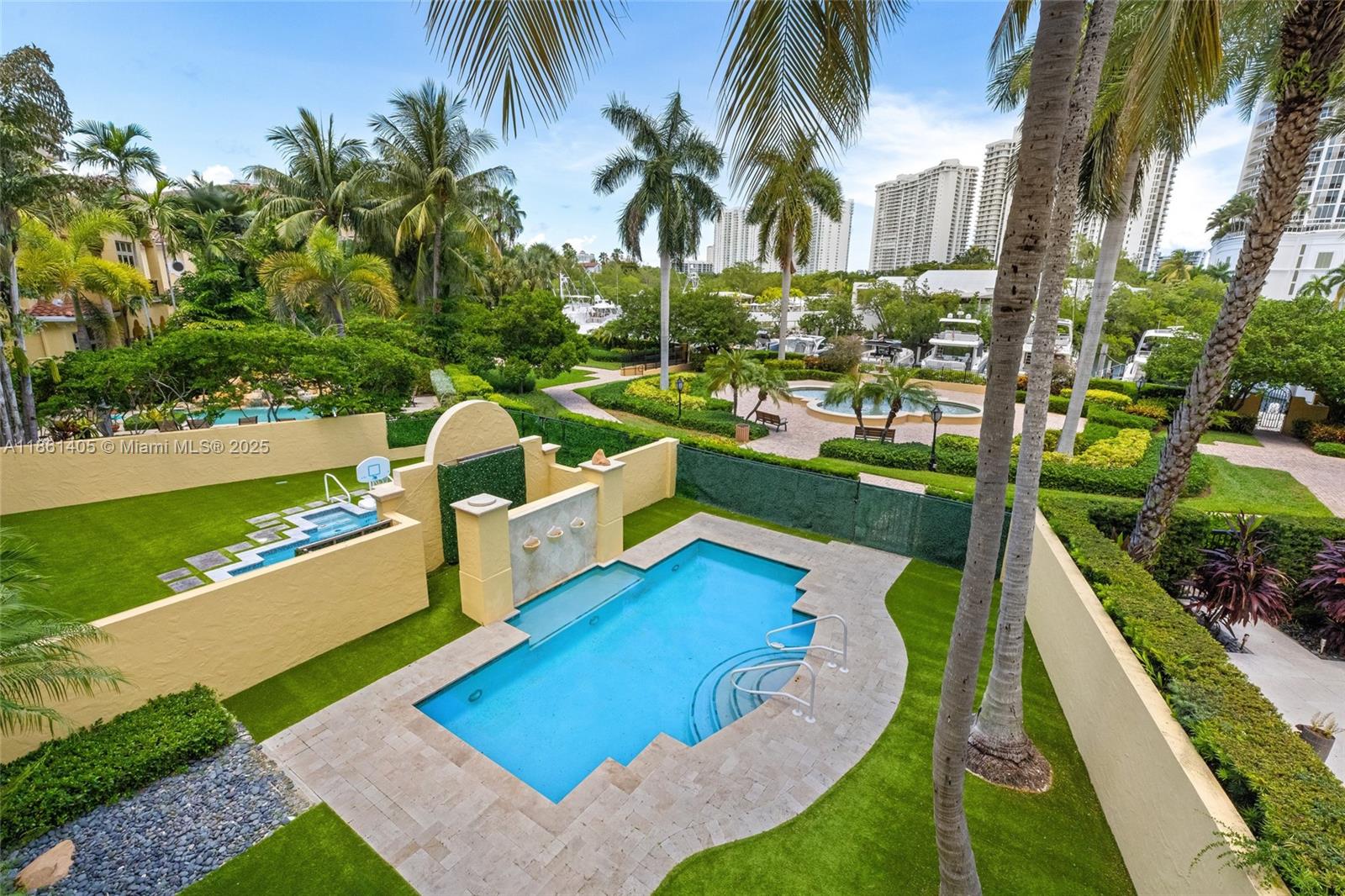 1504 Island Boulevard Aventura, FL 33160 - Photo 36 of 39 a view of a house with yard