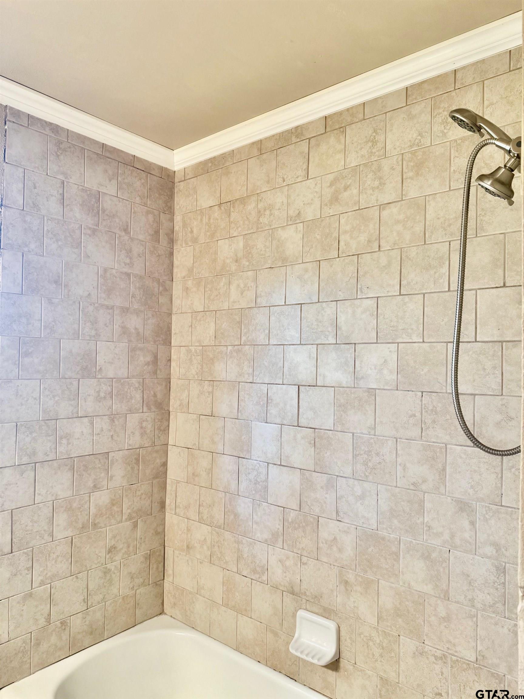 2408 Hunter Street Tyler, TX 75701 - Photo 22 of 33 a bathroom with a shower