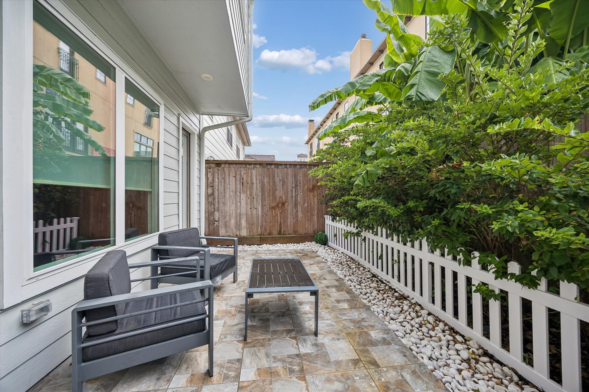 809 Malone Street Houston, TX 77007 - Photo 13 of 26 Private rear patio offering a peaceful outdoor living space.