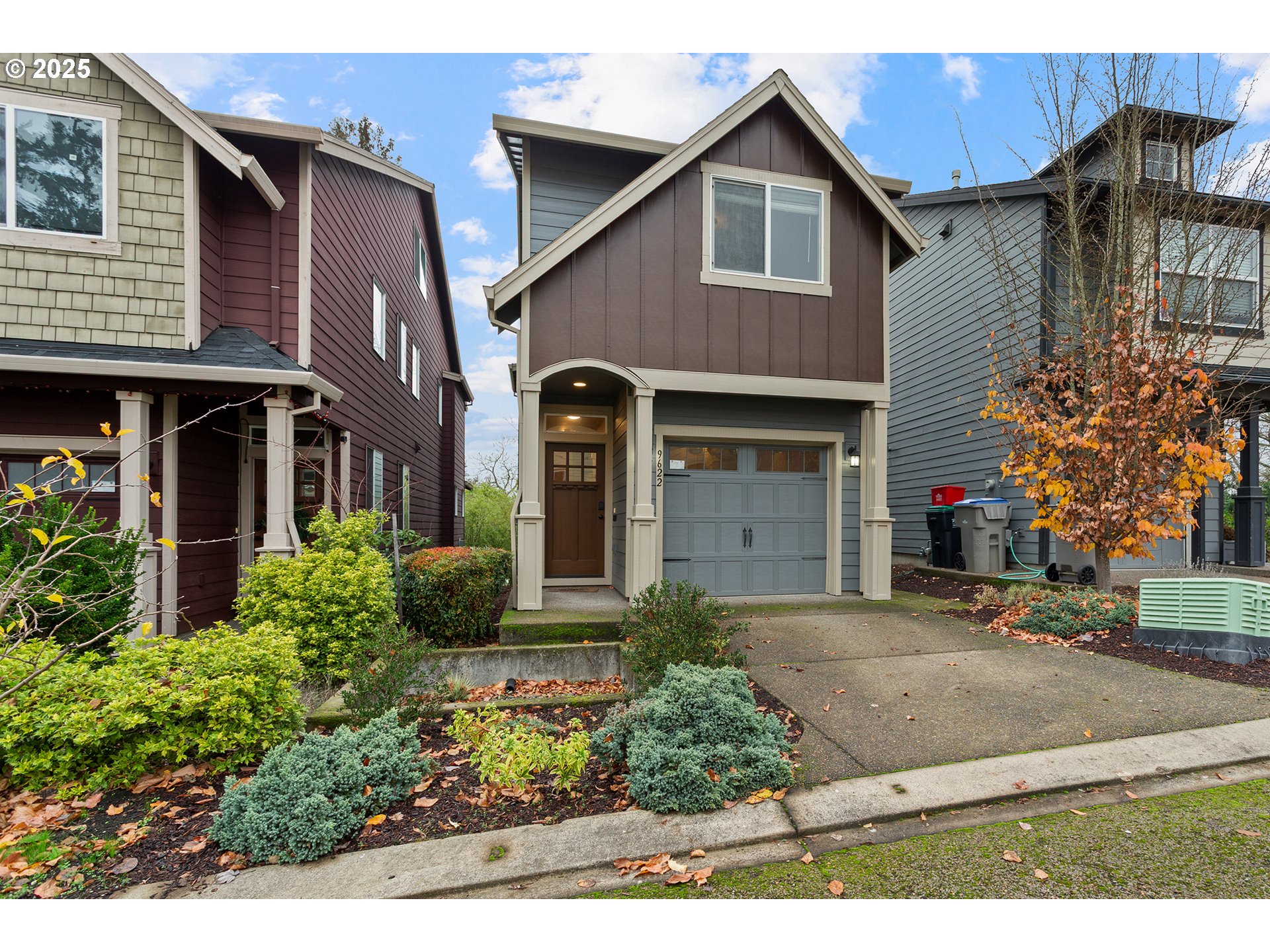 9622 Southwest Everett Terrace Tigard, OR 97223 - Photo 2 of 43 a front view of a house with garden